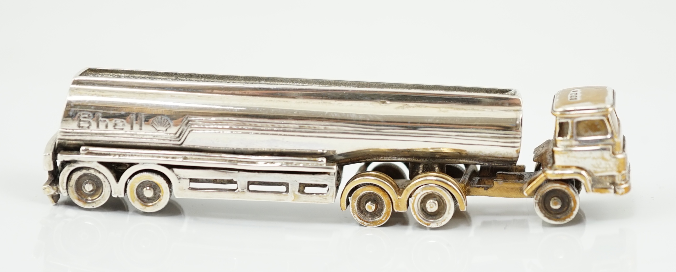An Elizabeth II parcel gilt silver miniature model of a Shell oil tanker, by Theo Fennell